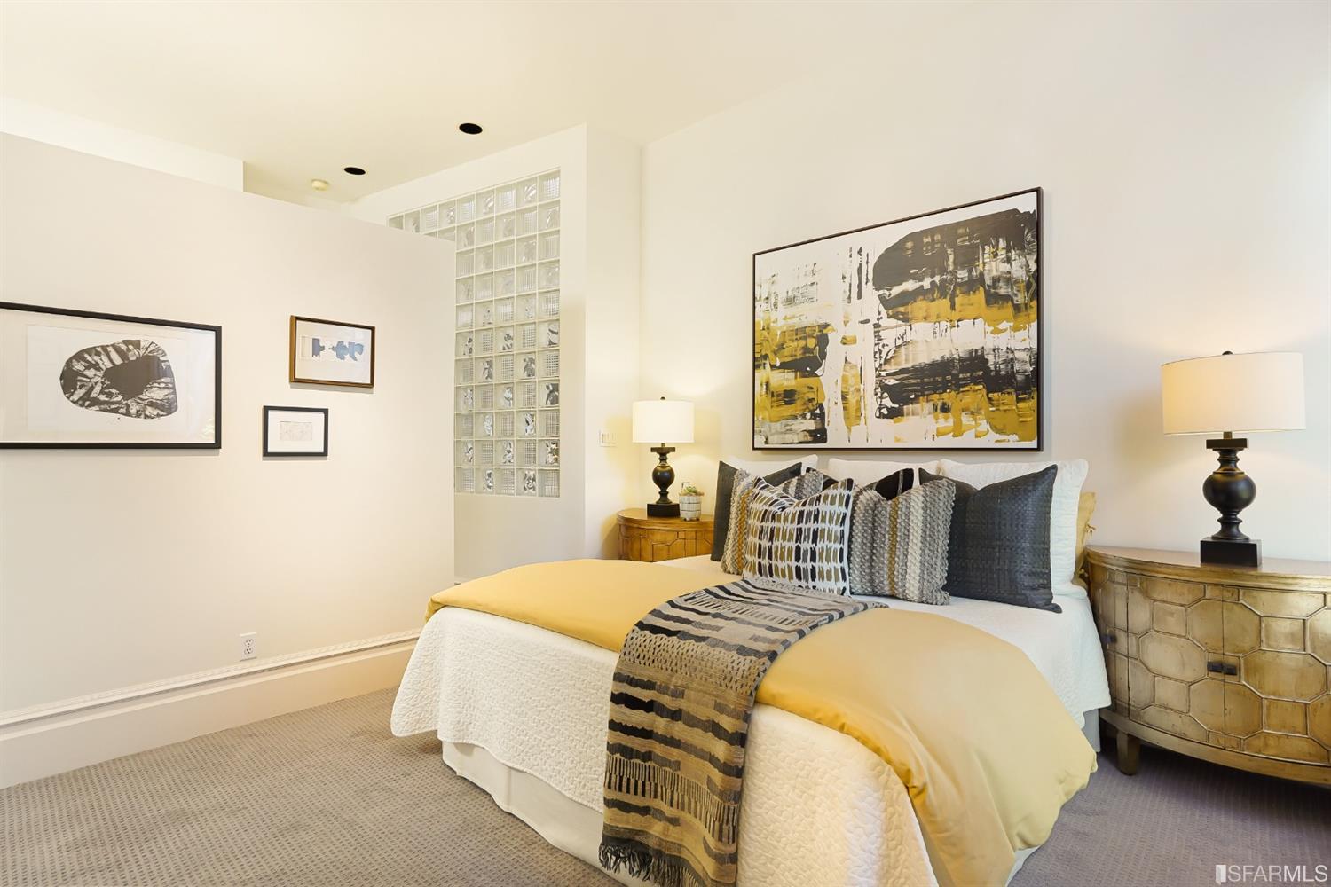 720 Waller Street San Francisco, CA 94117 - Photo 24 of 44 a bedroom with a bed and a painting on the wall