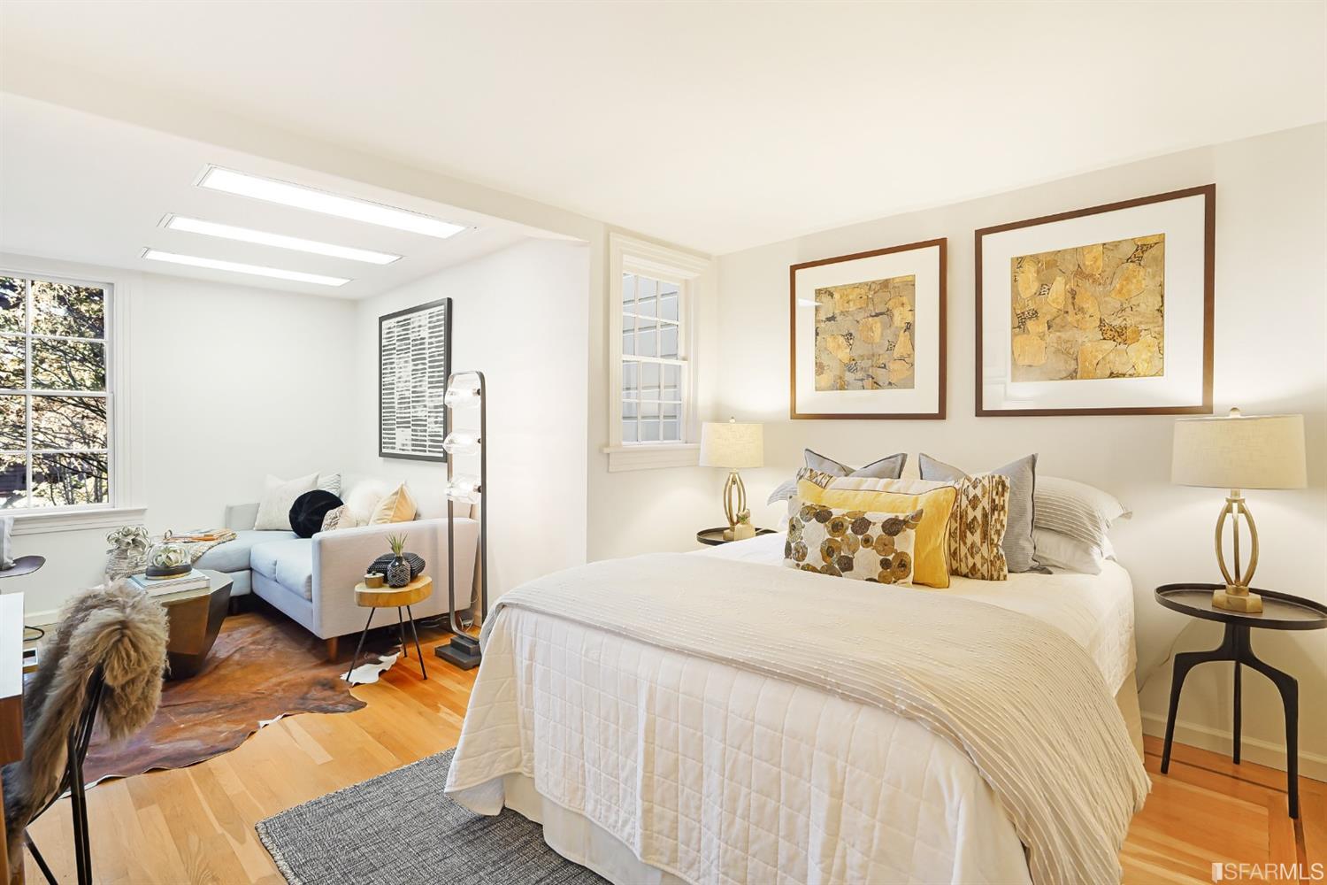 720 Waller Street San Francisco, CA 94117 - Photo 30 of 44 a bedroom with a bed and couch