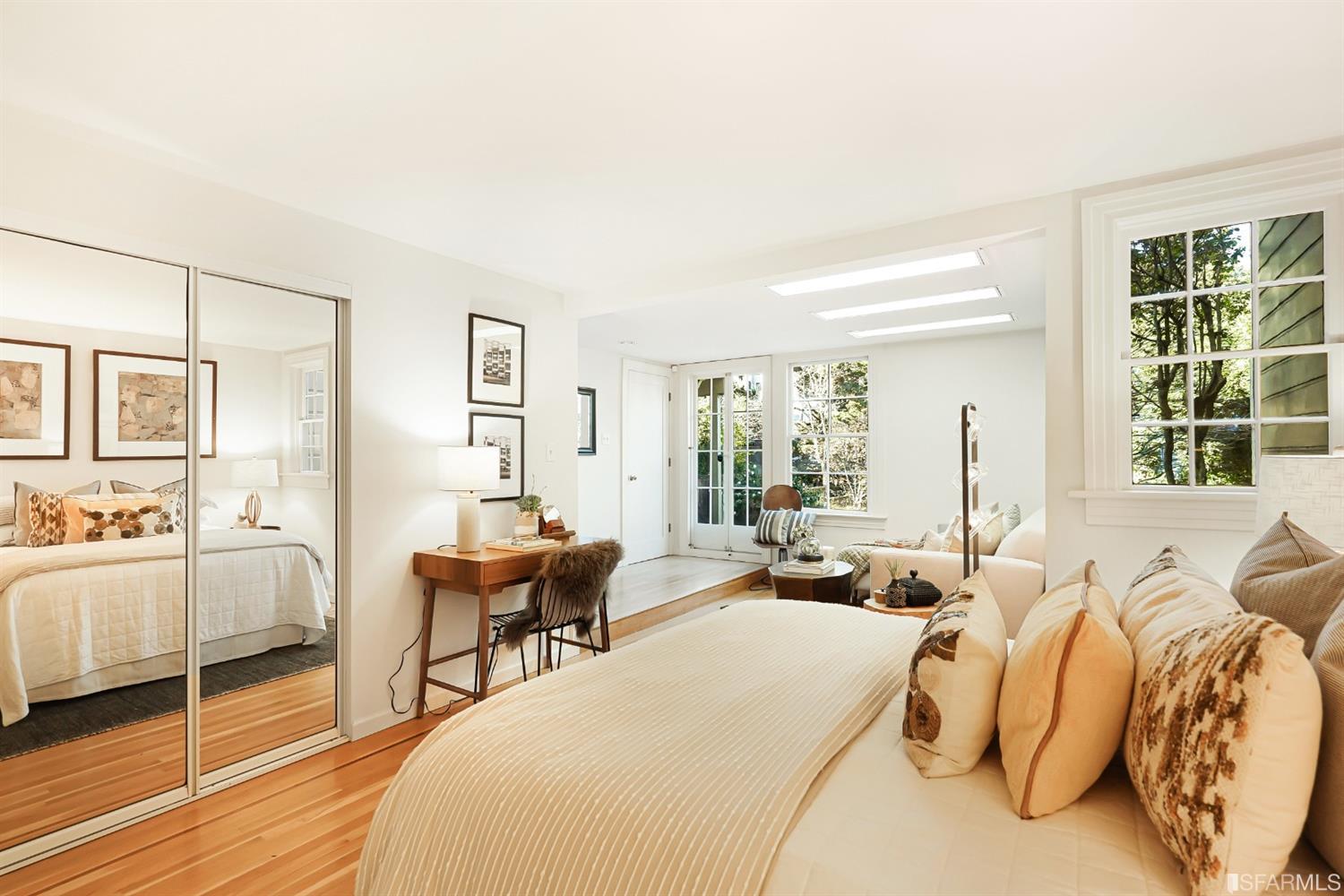 720 Waller Street San Francisco, CA 94117 - Photo 31 of 44 a spacious bedroom with a bed and a large window