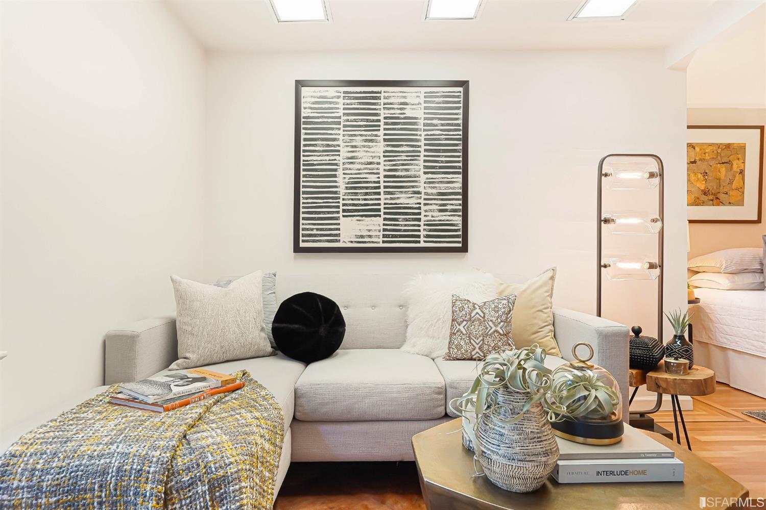 720 Waller Street San Francisco, CA 94117 - Photo 33 of 44 a bedroom with a bed and a couch