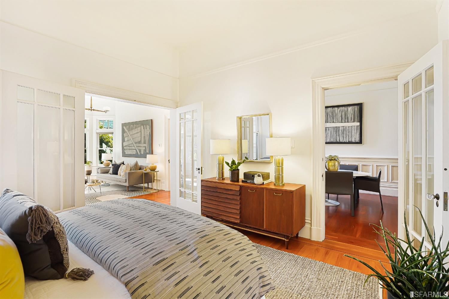 720 Waller Street San Francisco, CA 94117 - Photo 9 of 44 a bedroom with furniture and a large window