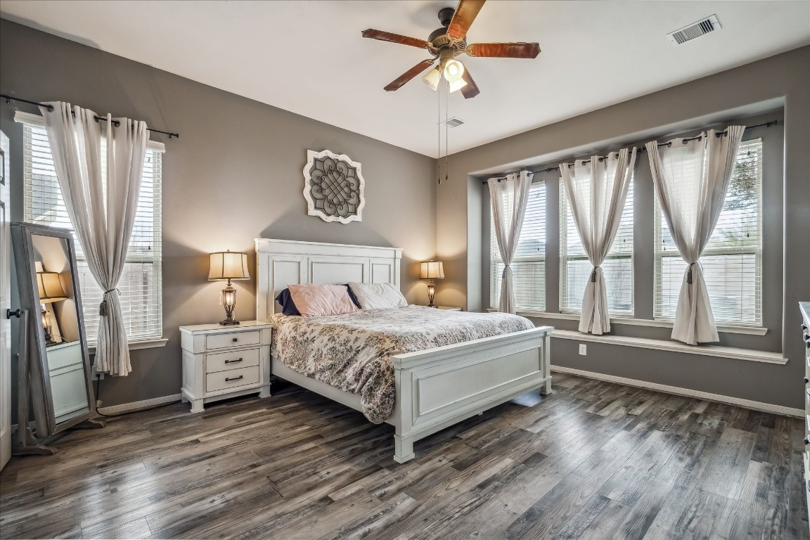 2902 Red Maple Drive Katy, TX 77494 - Photo 19 of 30 a bedroom with a large bed and a large window