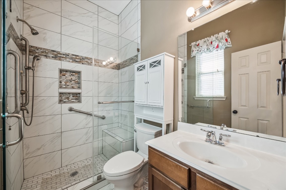 2902 Red Maple Drive Katy, TX 77494 - Photo 24 of 30 a bathroom with a sink toilet and shower