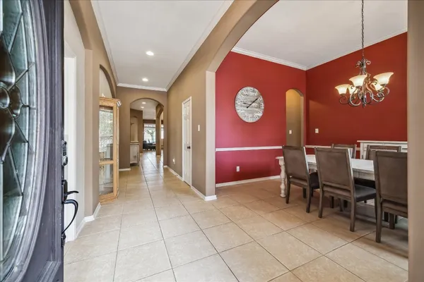 a view of a livingroom with furniture and a fan