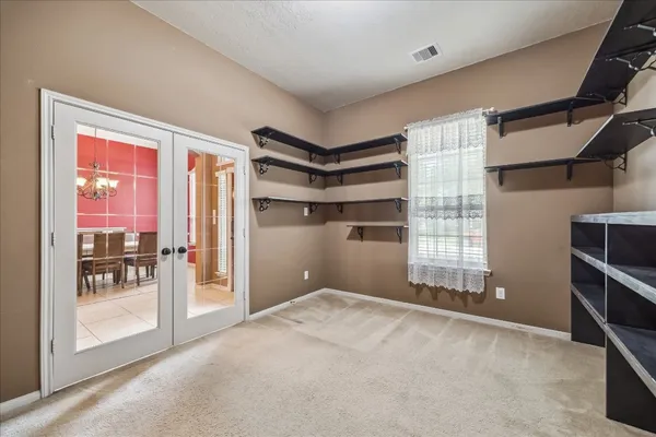 a view of empty room with front door