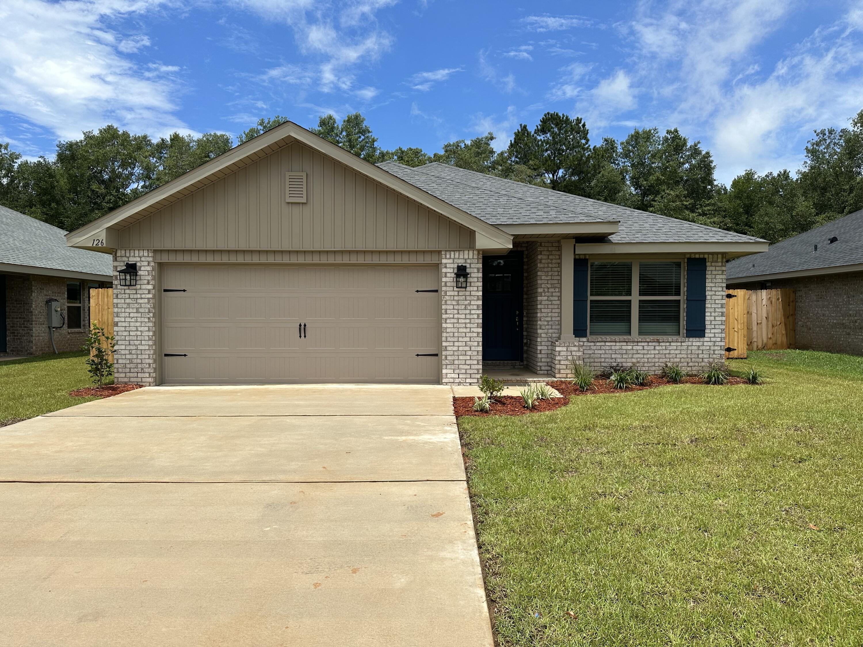 211 Baycliff Drive Crestview, FL 32536 - Photo 2 of 25 front view of house with a yard