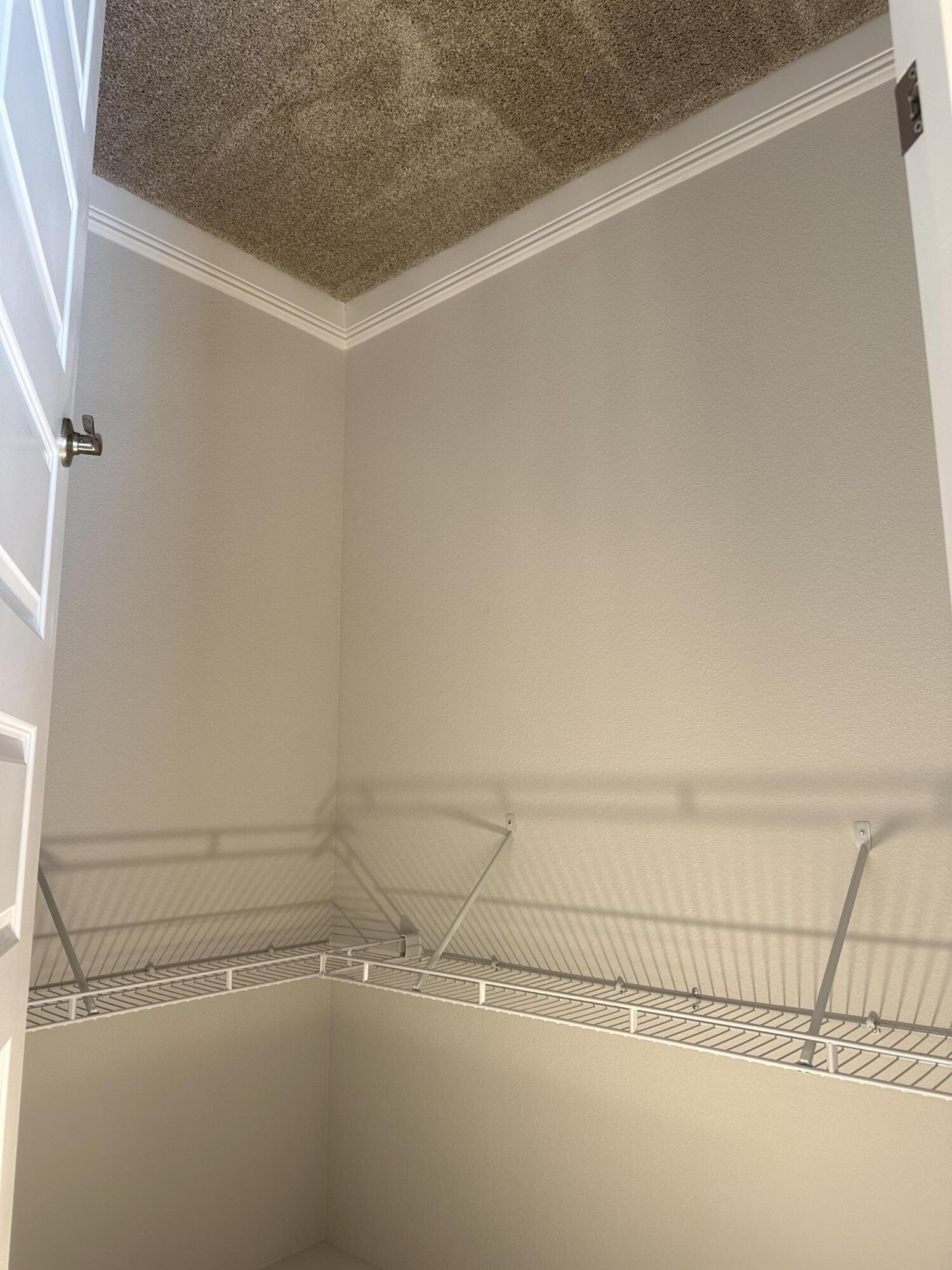 211 Baycliff Drive Crestview, FL 32536 - Photo 21 of 25 a view of a room with racks on the wall