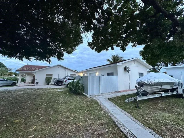 a house view with a garden space