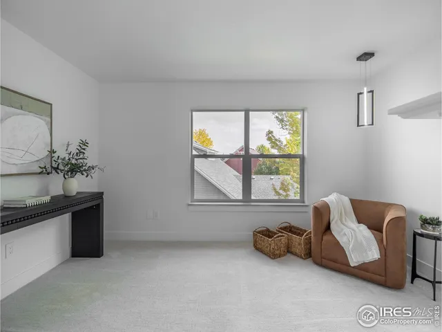 a room with furniture and a window