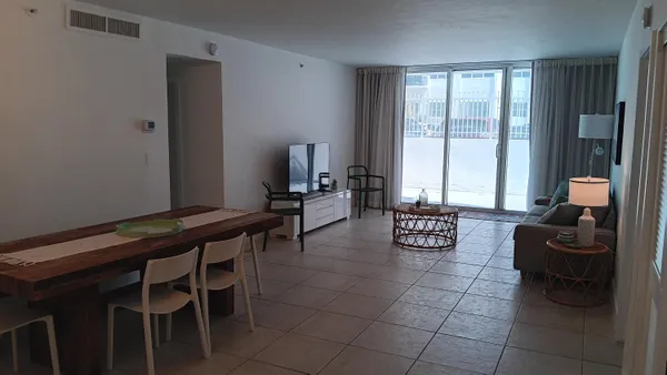 a outdoor living space with furniture and window