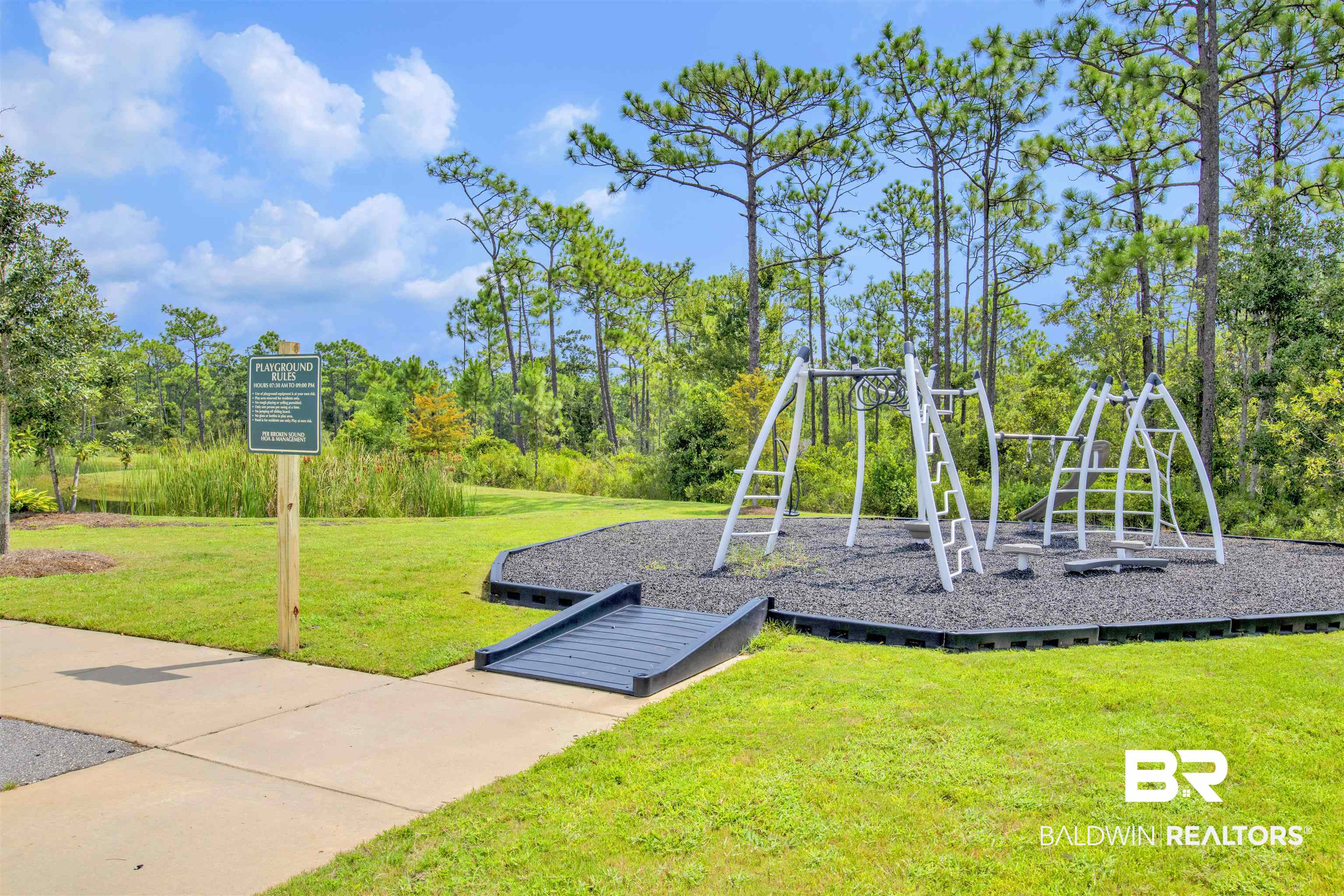 24532 Broken Sound Loop Orange Beach, AL 36561 - Photo 29 of 29 View of play area featuring a lawn