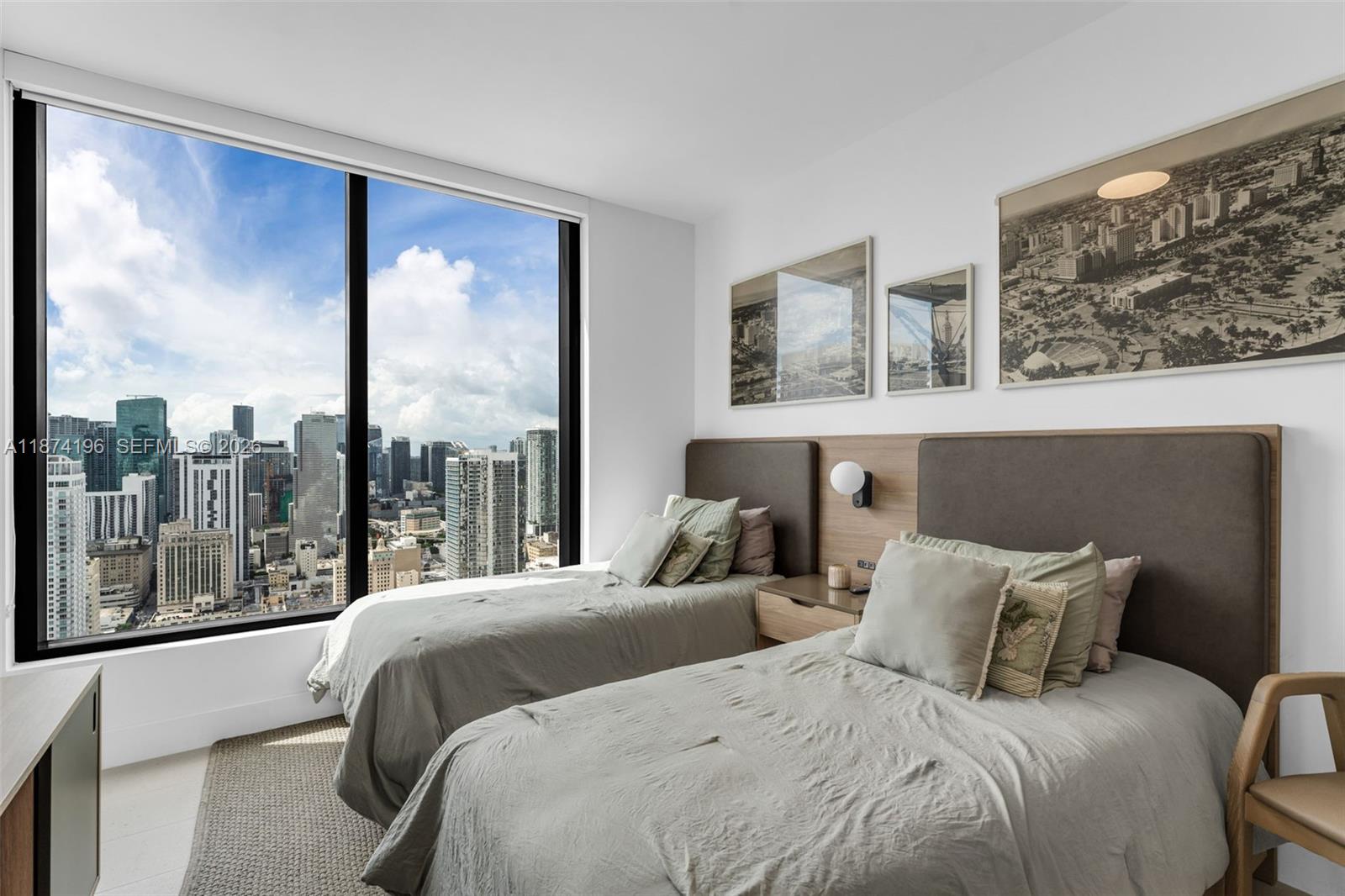 159 Northeast 6th Street, Unit 4016 Miami, FL 33132 - Photo 22 of 50 a bedroom with bed and a large window