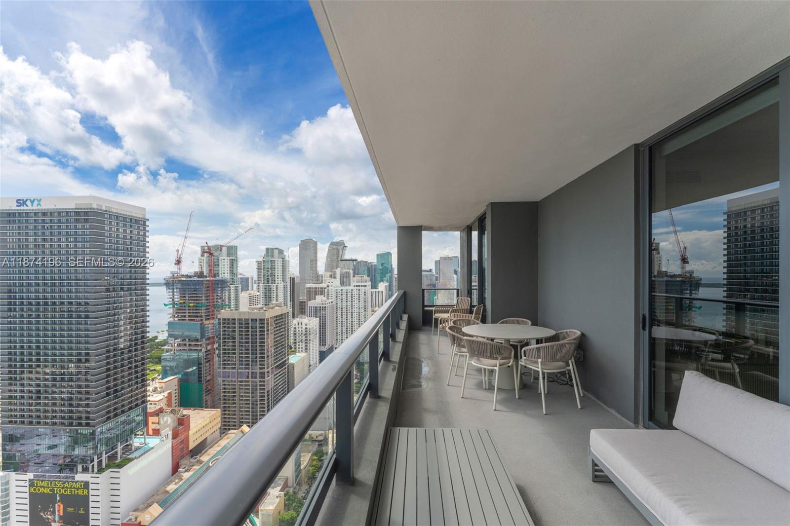 159 Northeast 6th Street, Unit 4016 Miami, FL 33132 - Photo 26 of 50 a balcony with chairs