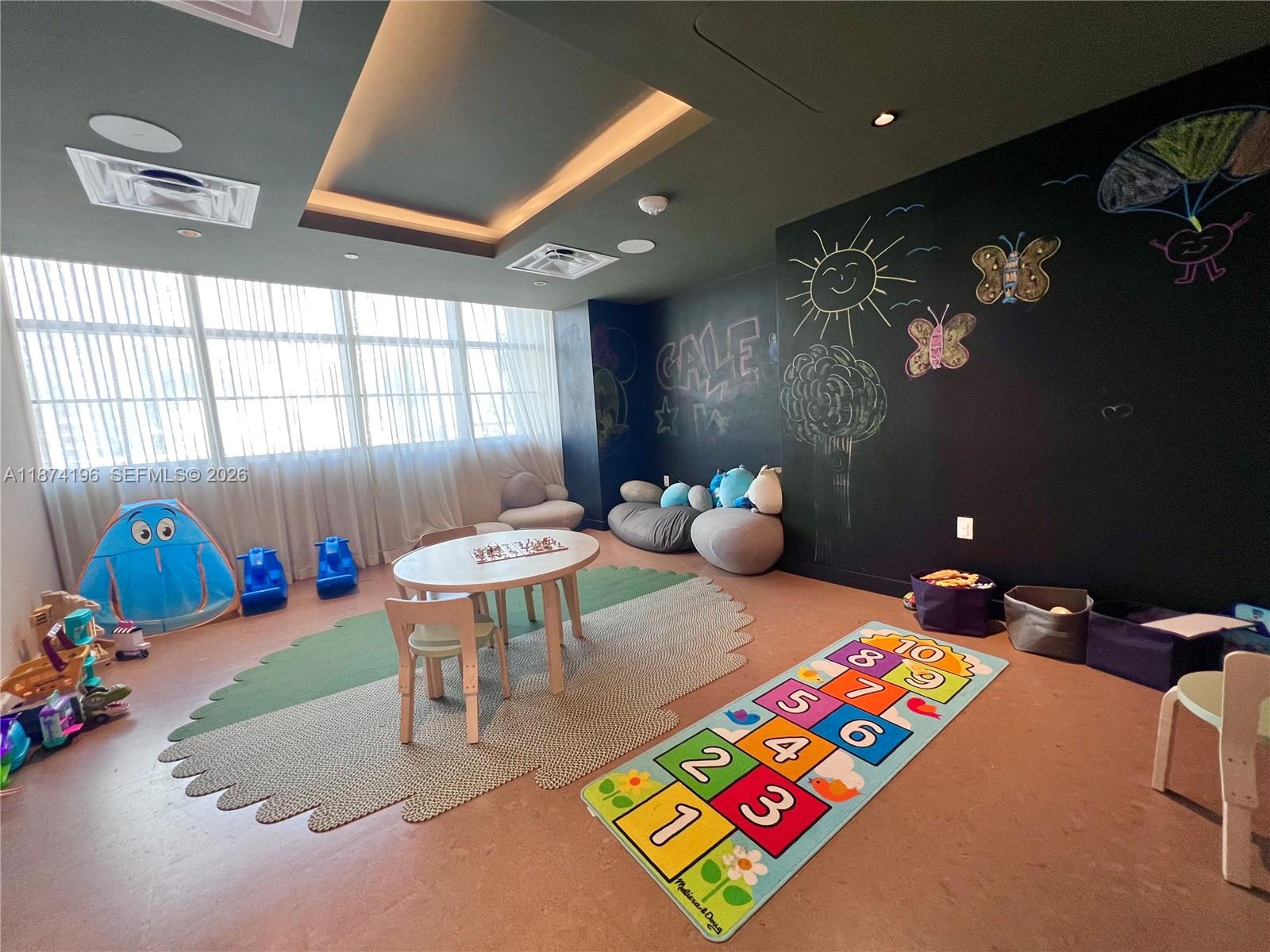 159 Northeast 6th Street, Unit 4016 Miami, FL 33132 - Photo 47 of 50 a living room with furniture and a table