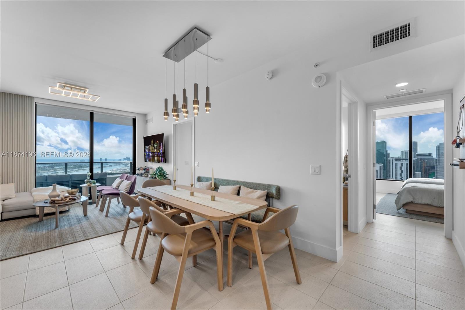 159 Northeast 6th Street, Unit 4016 Miami, FL 33132 - Photo 9 of 50 a view of a dining room with furniture window and outside view