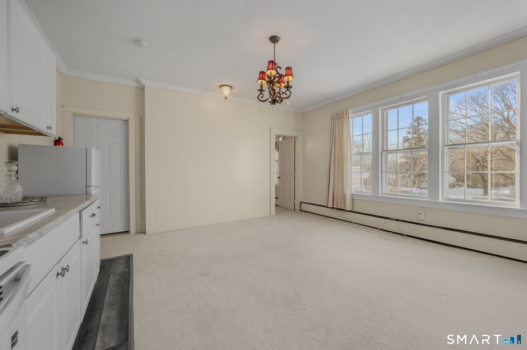 9 Lyme Street, Unit 7 Old Lyme, CT 06371 - Photo 12 of 23 a view of an empty room with a window