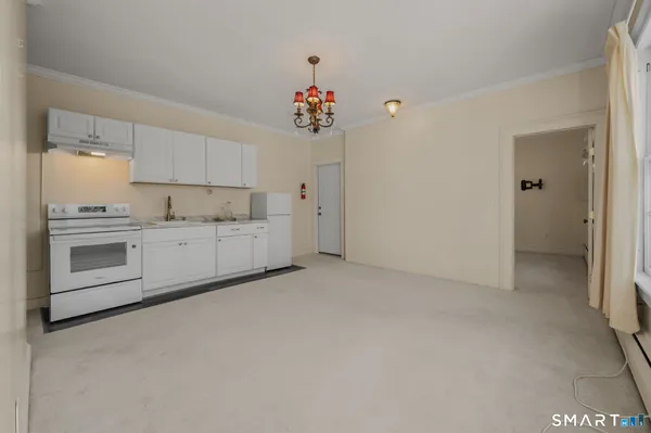 a view of a kitchen with a sink