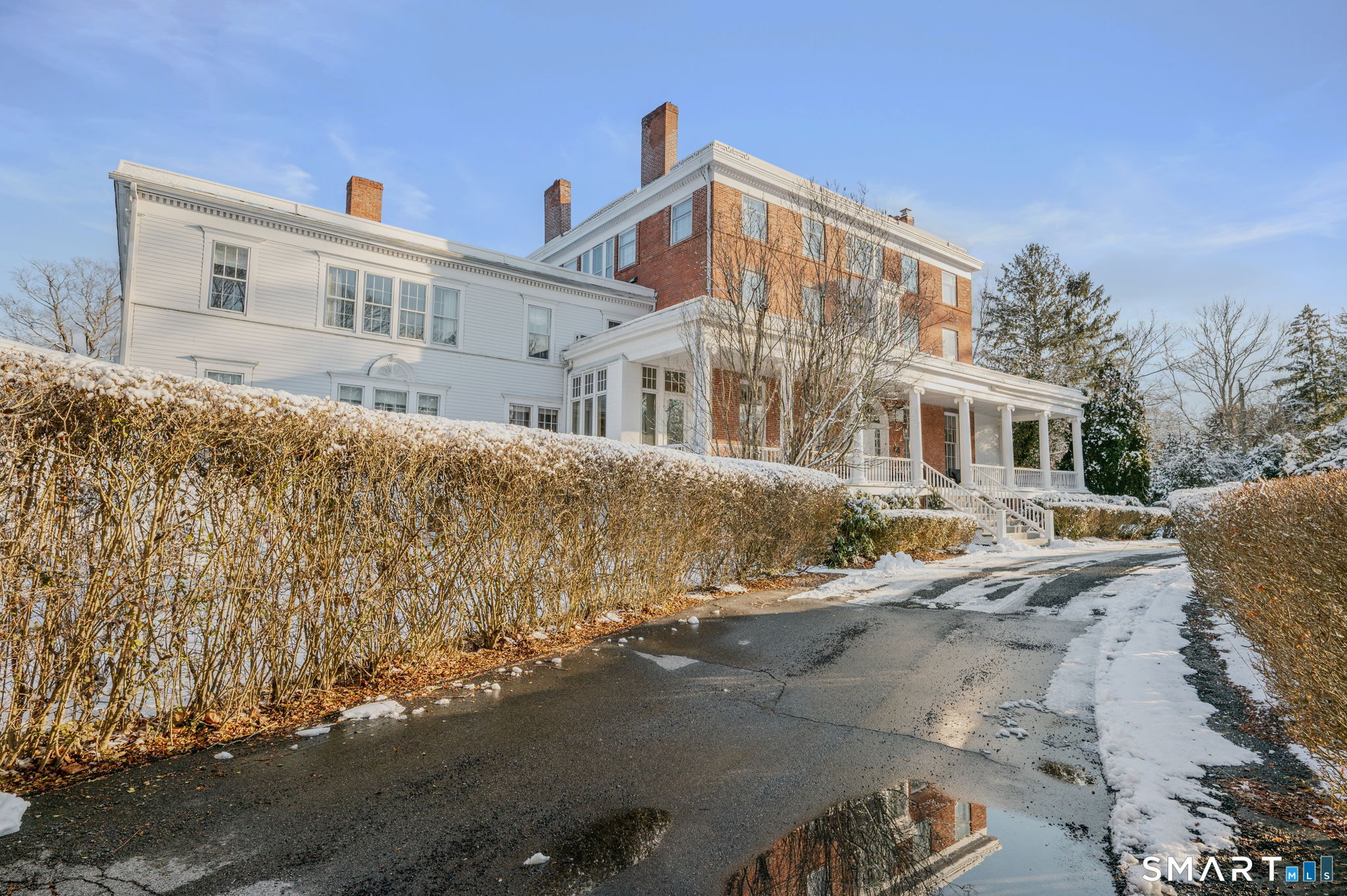 9 Lyme Street, Unit 7 Old Lyme, CT 06371 - Photo 2 of 23 a view of a house with a yard