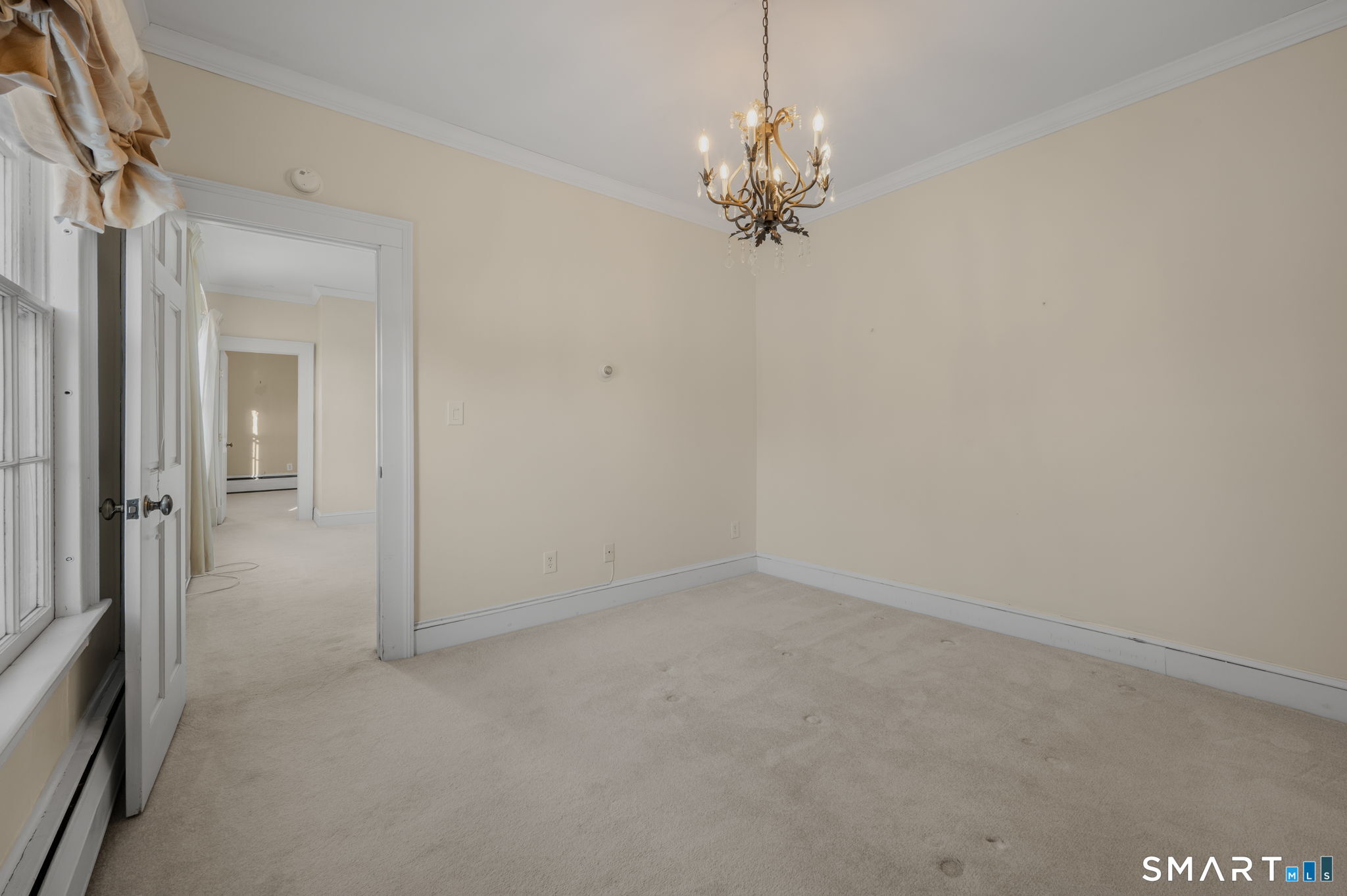 9 Lyme Street, Unit 7 Old Lyme, CT 06371 - Photo 23 of 23 wooden floor in an empty room