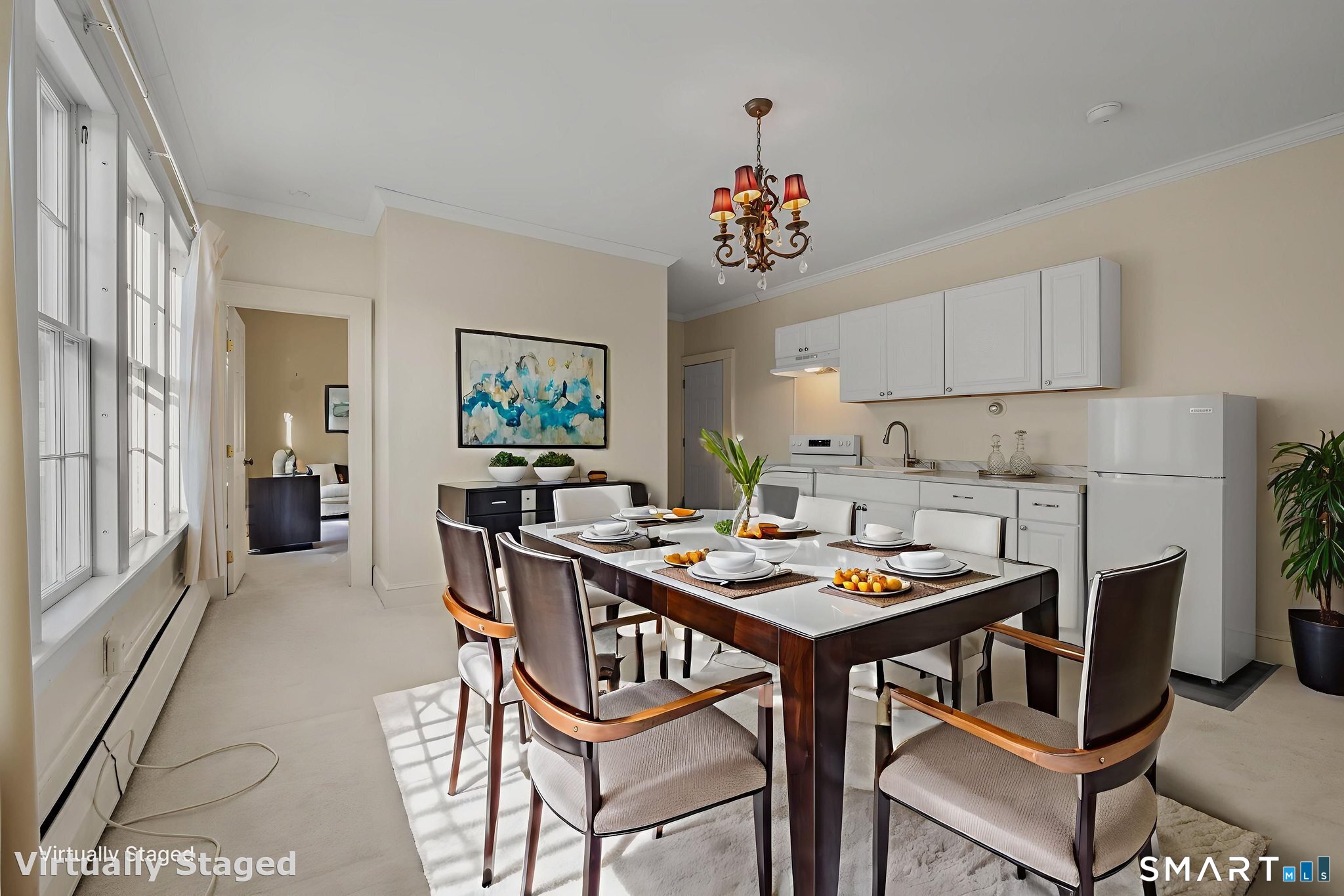 9 Lyme Street, Unit 7 Old Lyme, CT 06371 - Photo 10 of 23 a view of a dining room with furniture window and wooden floor