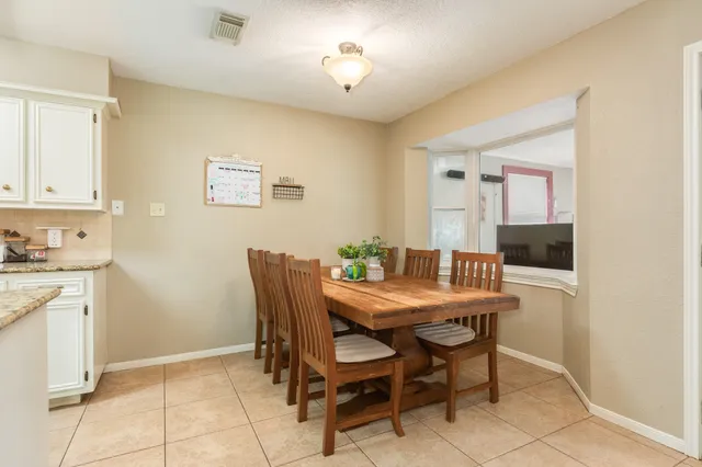 a view of a dining room with furniture