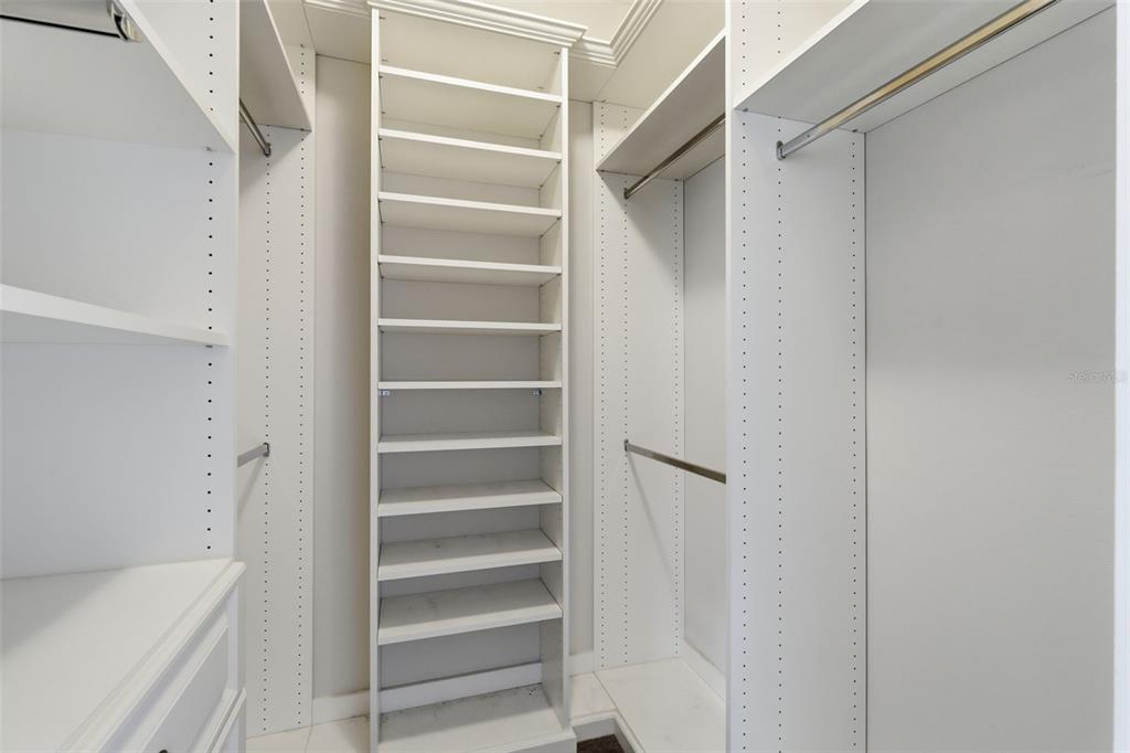 34144 Spring Oak Trail Wesley Chapel, FL 33545 - Photo 11 of 37 a view of walk in closet with empty racks