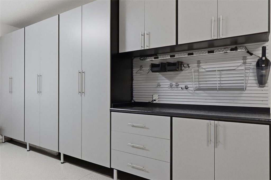 34144 Spring Oak Trail Wesley Chapel, FL 33545 - Photo 27 of 37 a view of kitchen with granite countertop cabinets