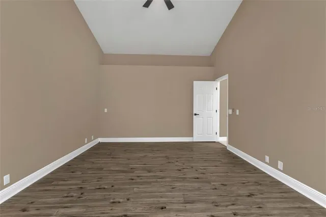 a bathroom with a sink a large mirror and a bathtub