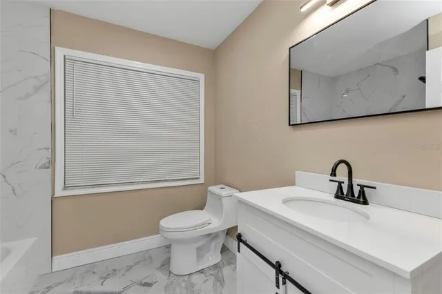 a bathroom with a bathtub