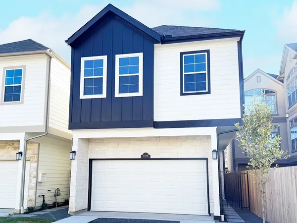 a door view of a house with a garage