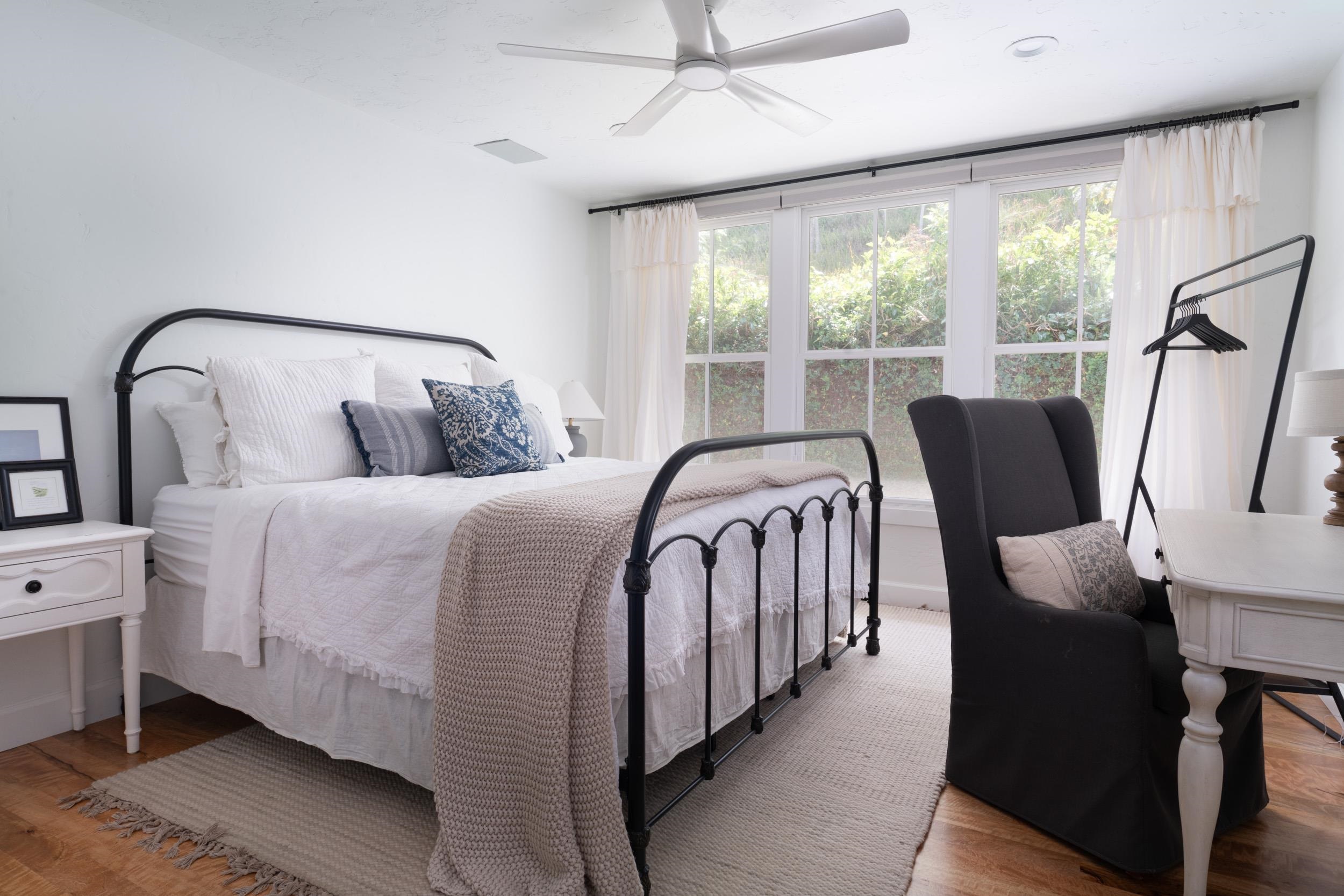 1630 Olinda Road Makawao, HI 96768 - Photo 11 of 50 a bedroom with furniture and wooden floor