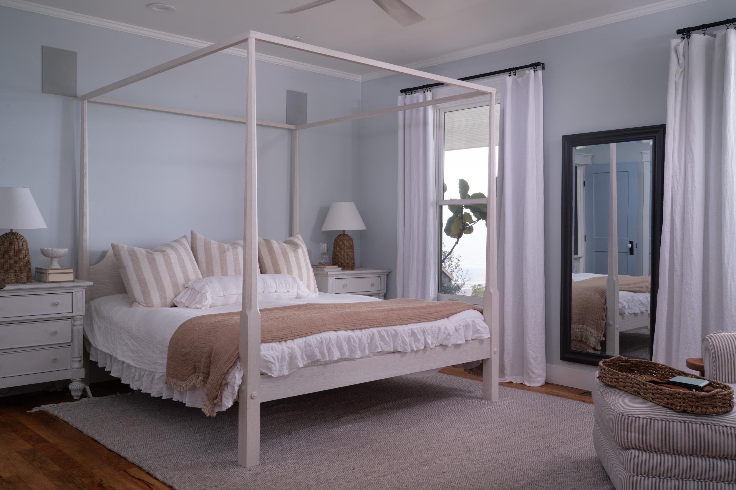 1630 Olinda Road Makawao, HI 96768 - Photo 13 of 50 a bedroom with a bed and a mirror