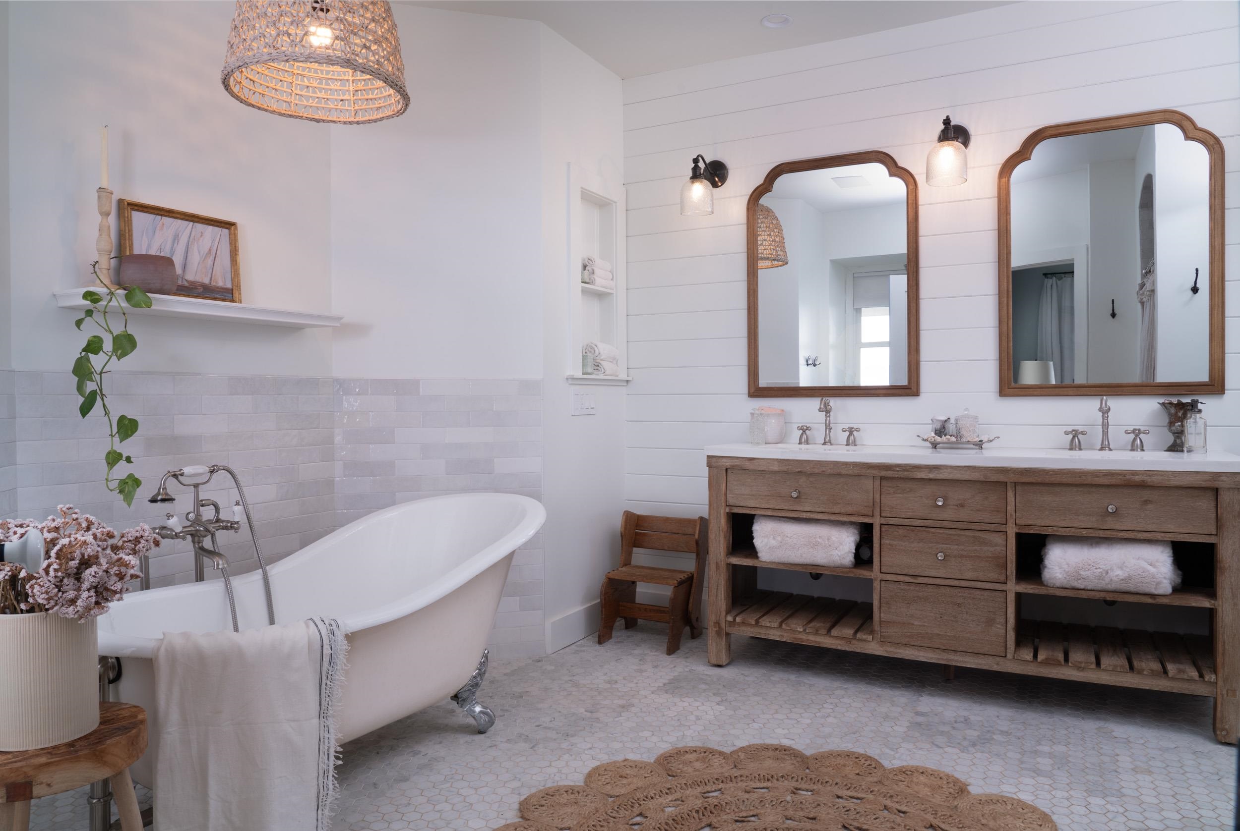 1630 Olinda Road Makawao, HI 96768 - Photo 15 of 50 a spacious bathroom with a granite countertop bathtub a sink and a large mirror