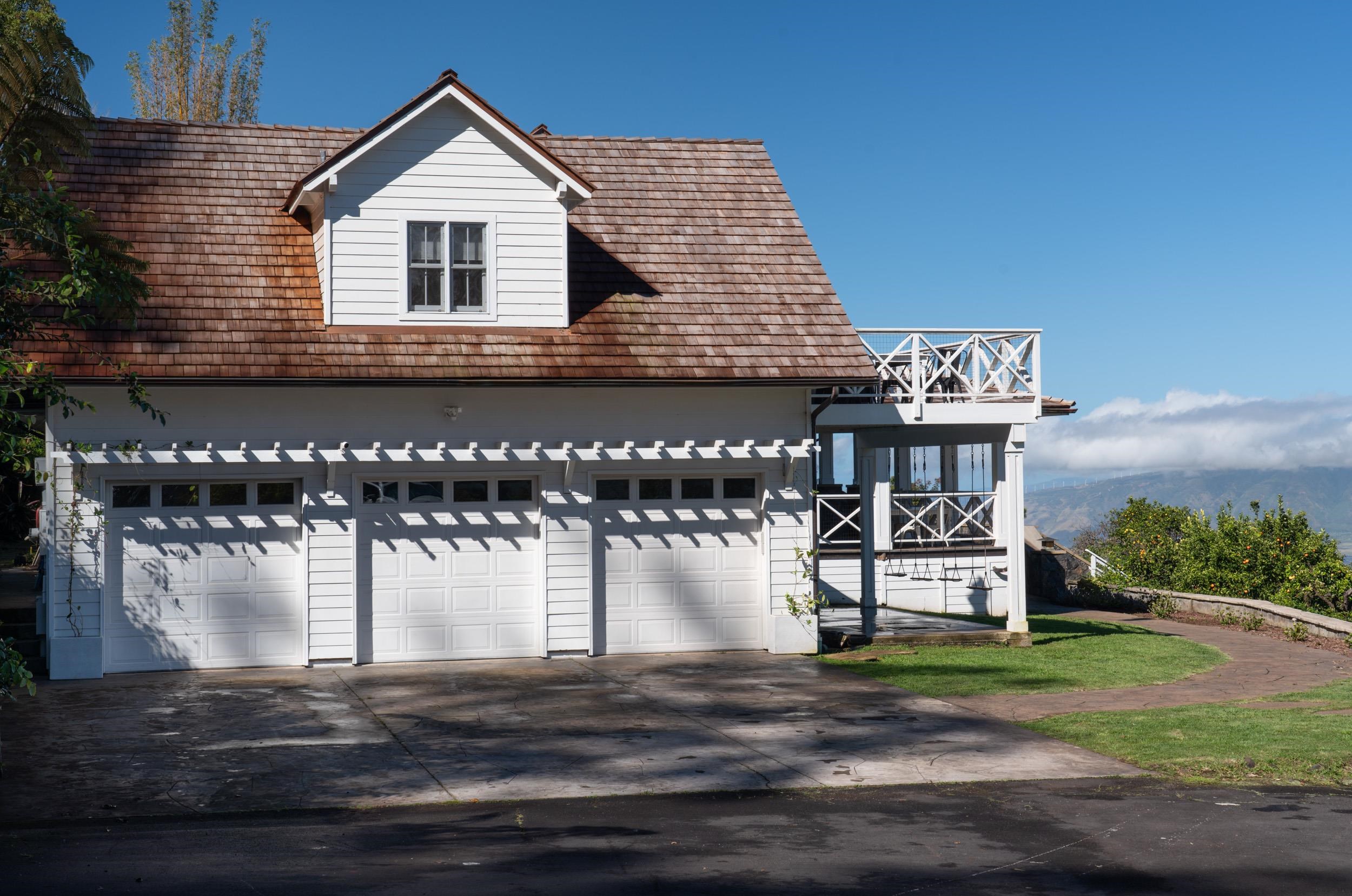 1630 Olinda Road Makawao, HI 96768 - Photo 32 of 50 a front view of a house with a yard