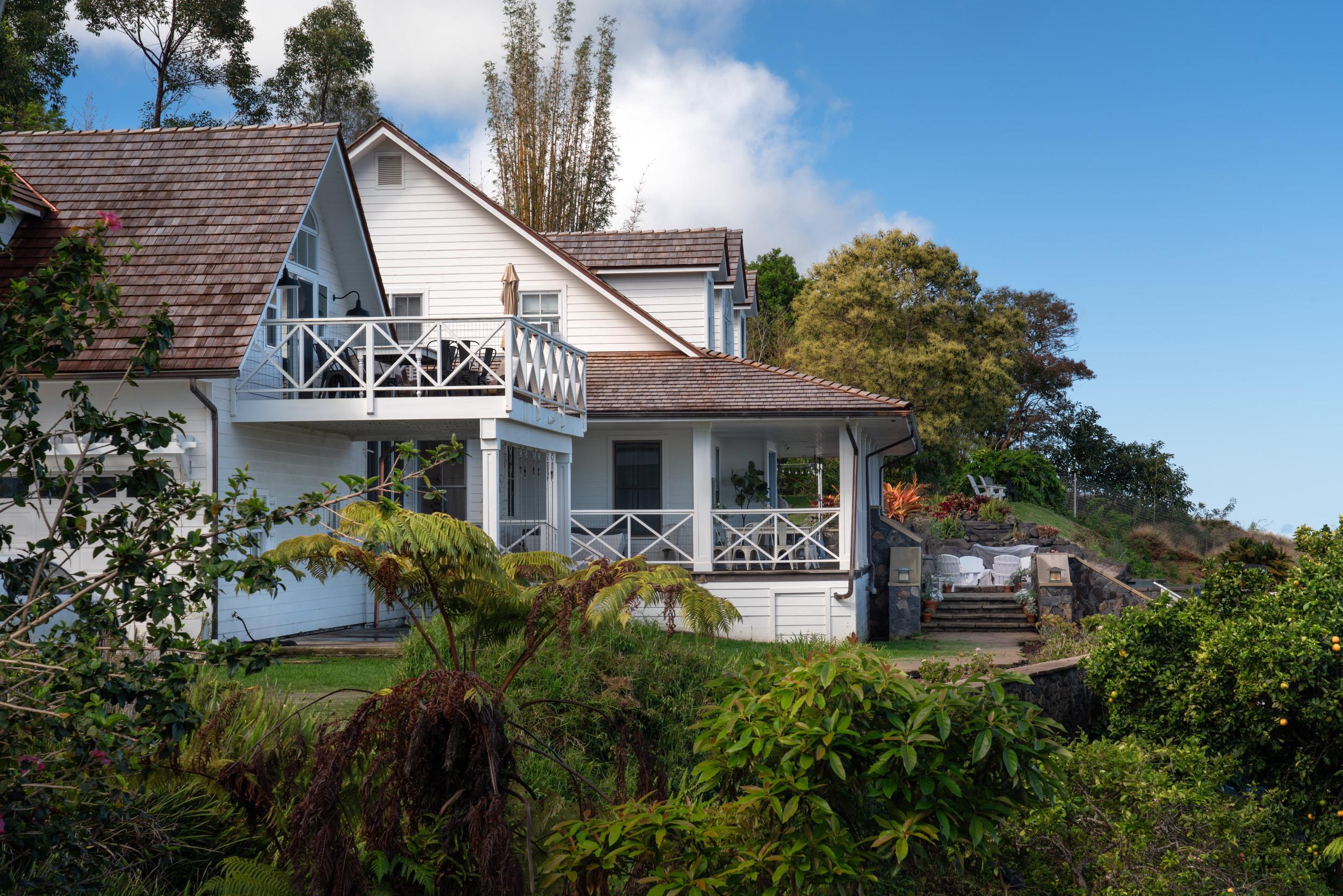 1630 Olinda Road Makawao, HI 96768 - Photo 33 of 50 a front view of a house with garden
