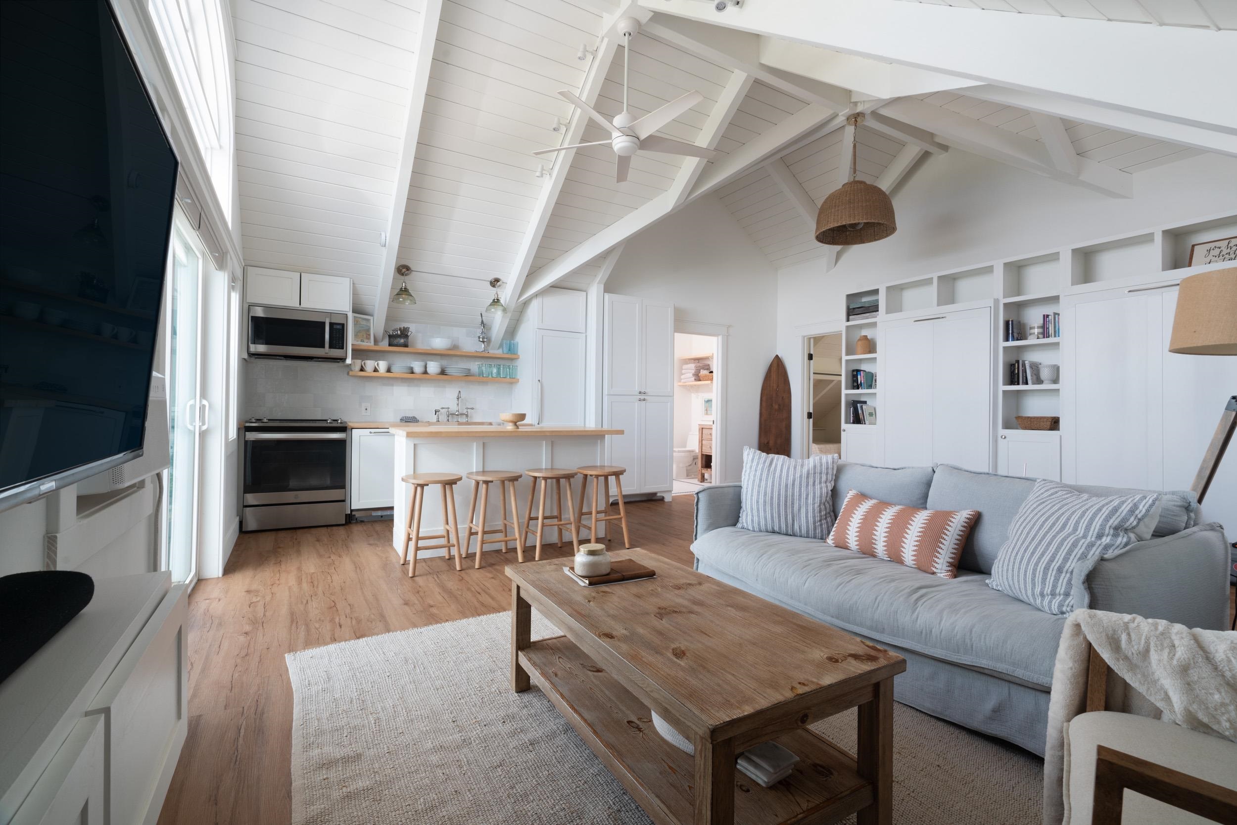 1630 Olinda Road Makawao, HI 96768 - Photo 35 of 50 a living room with furniture and a fireplace