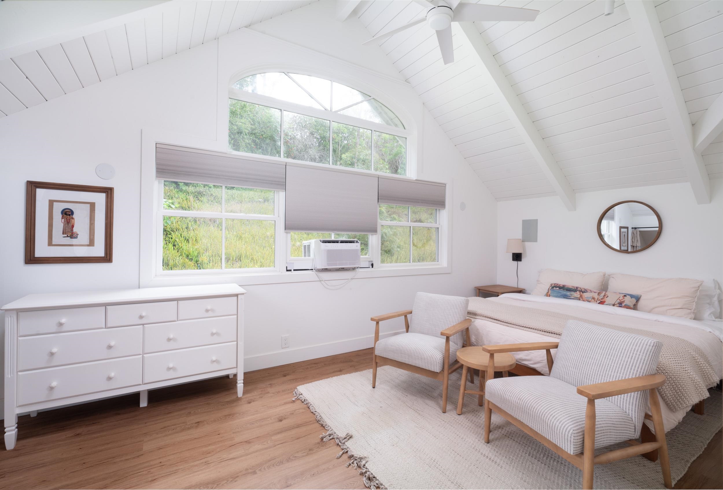 1630 Olinda Road Makawao, HI 96768 - Photo 36 of 50 a bedroom with a bed and a window