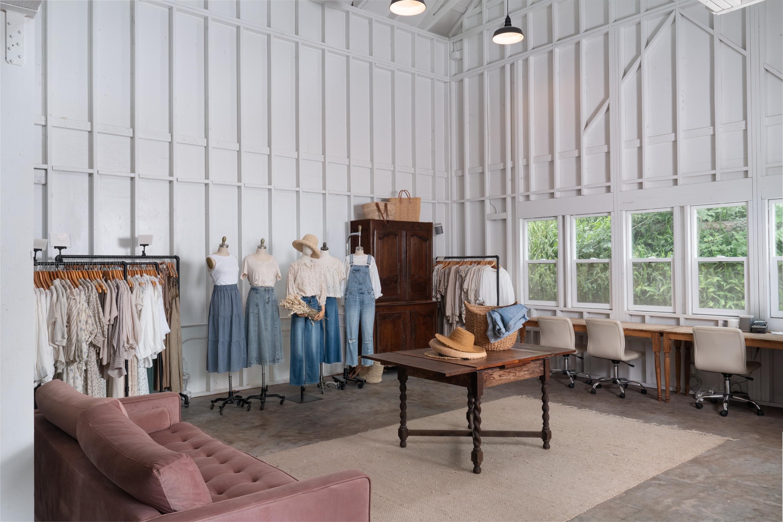 1630 Olinda Road Makawao, HI 96768 - Photo 39 of 50 a living room with furniture a large window and a fireplace