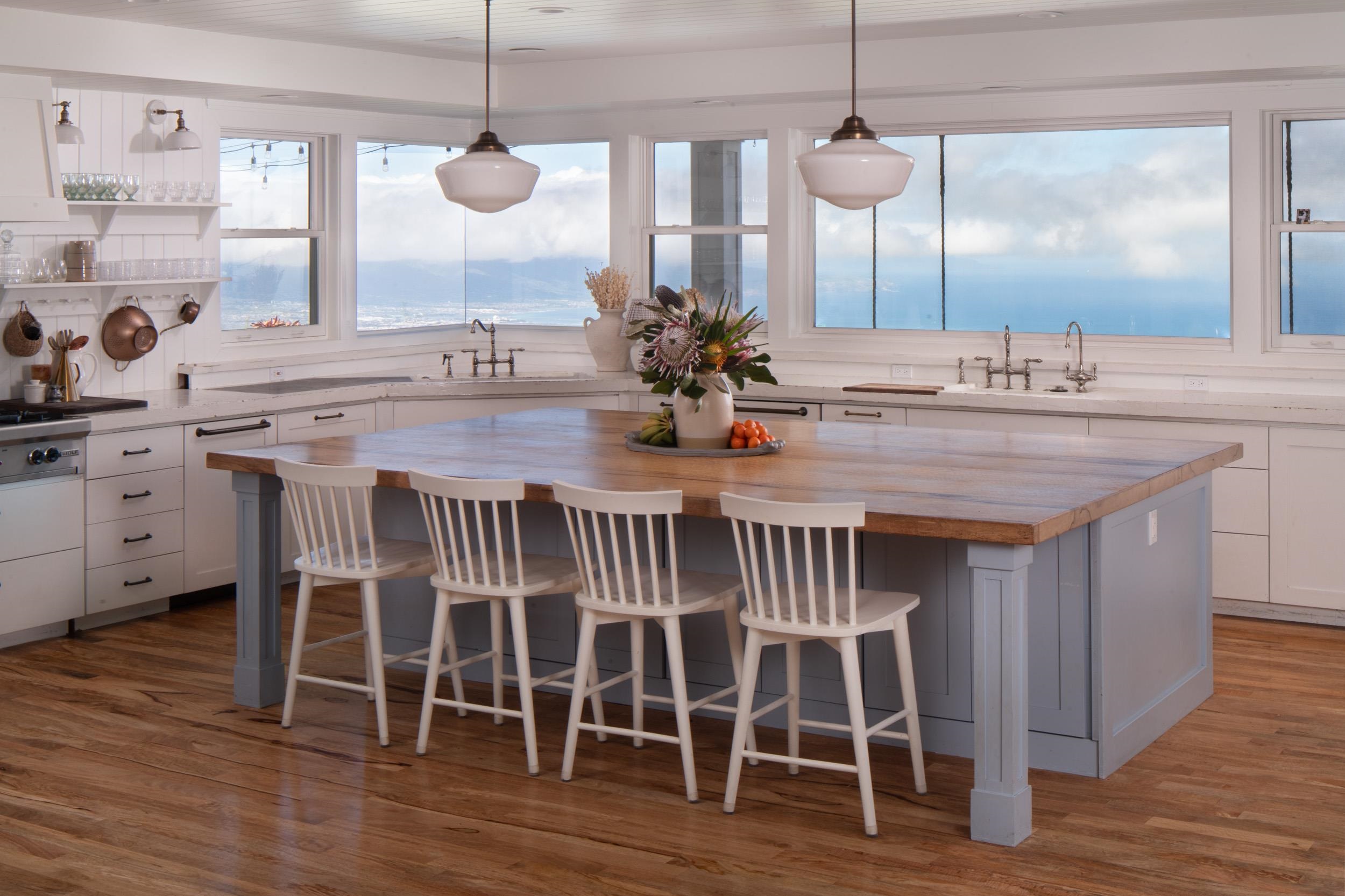1630 Olinda Road Makawao, HI 96768 - Photo 4 of 50 a kitchen with wooden floor window and chairs