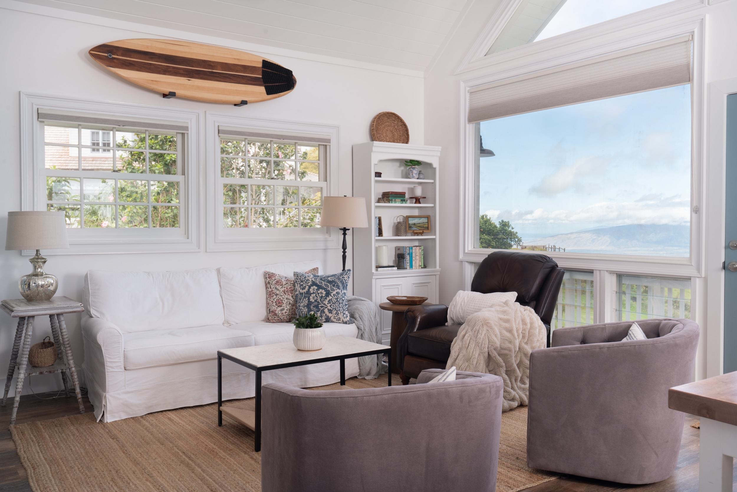 1630 Olinda Road Makawao, HI 96768 - Photo 43 of 50 a living room with furniture and a large window