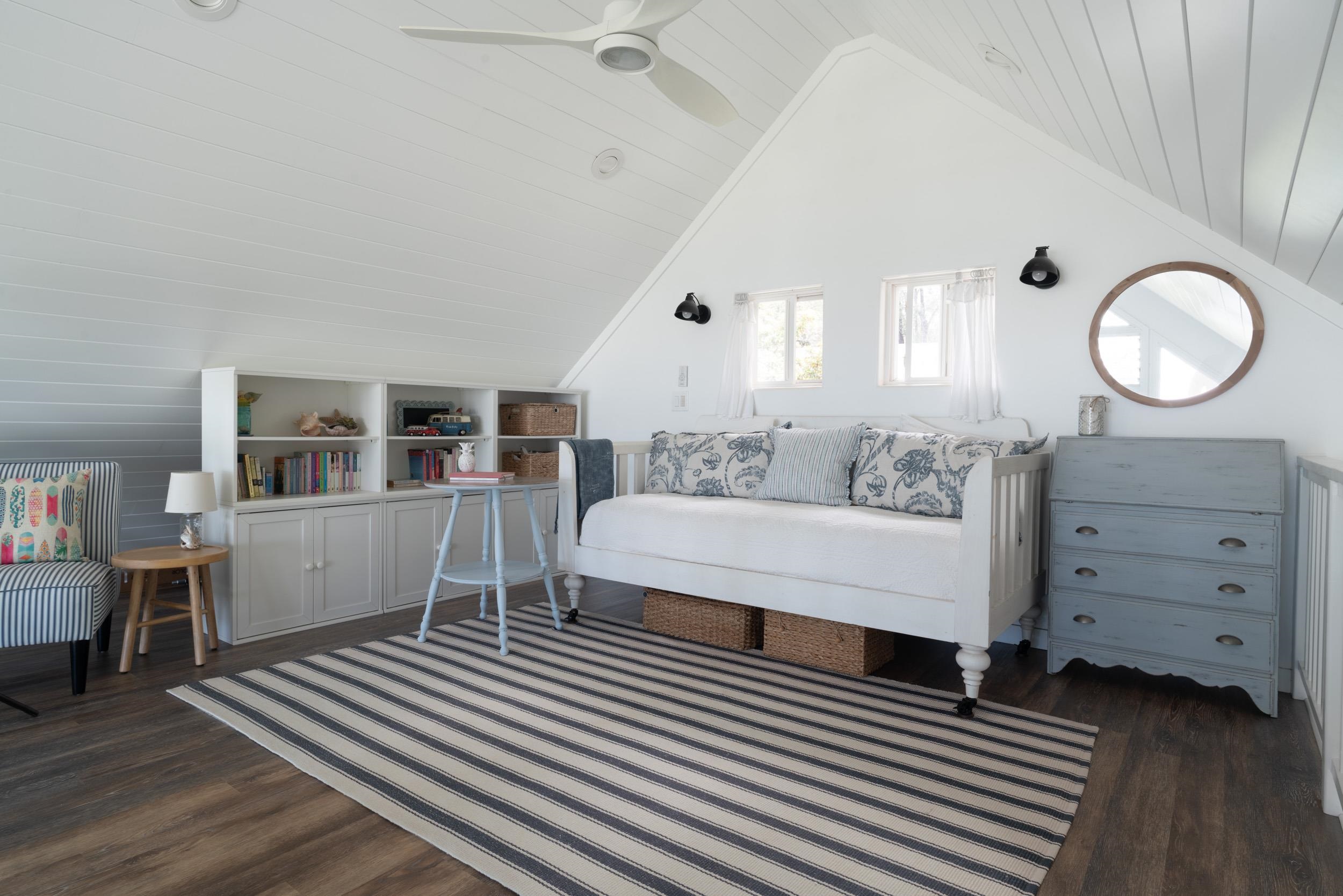 1630 Olinda Road Makawao, HI 96768 - Photo 45 of 50 a spacious bedroom with a bed and a dresser in it