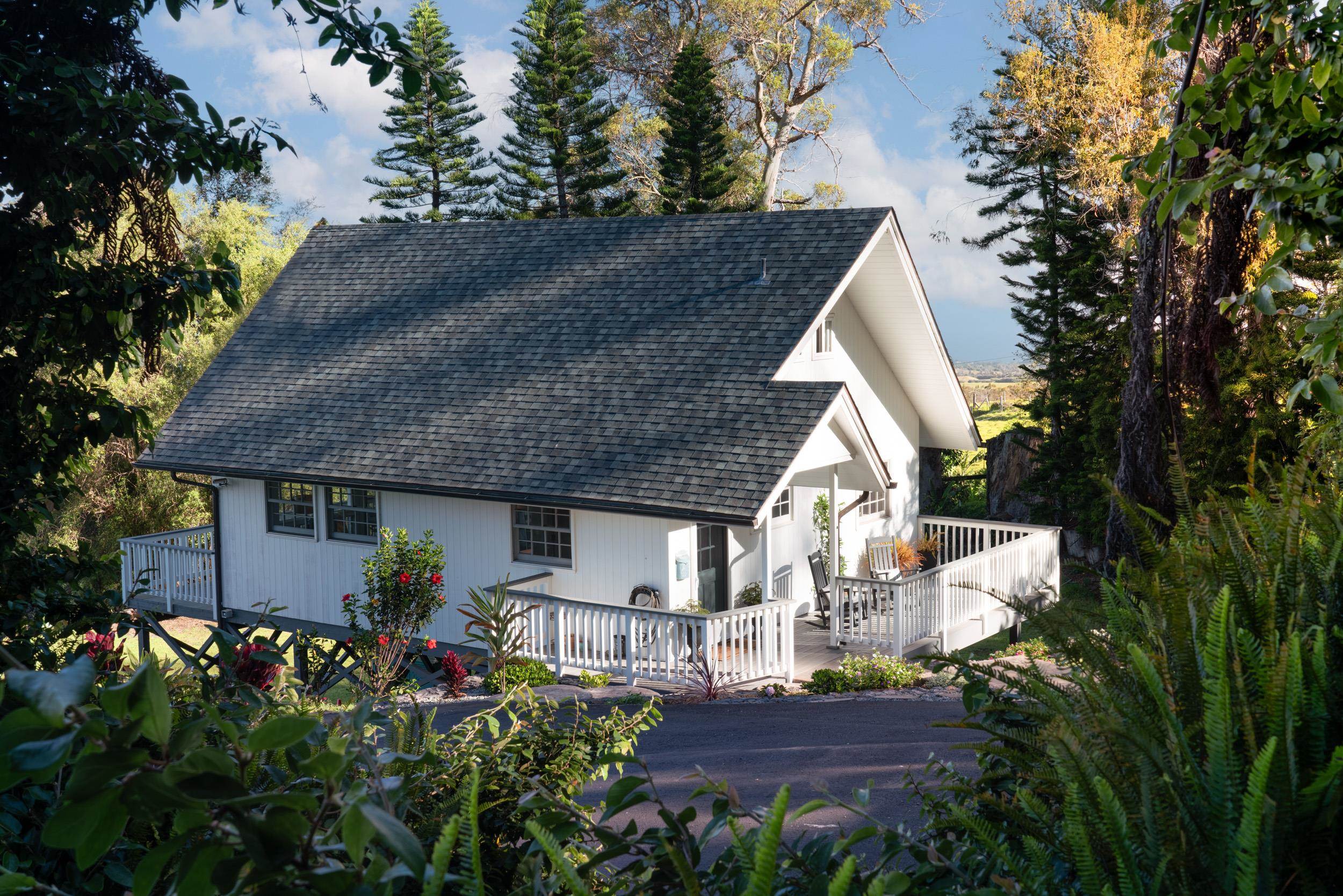 1630 Olinda Road Makawao, HI 96768 - Photo 47 of 50 a front view of house with a garden