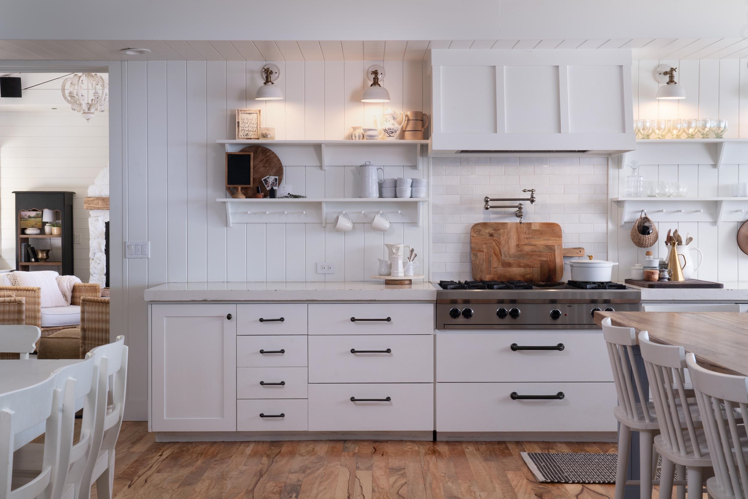 1630 Olinda Road Makawao, HI 96768 - Photo 5 of 50 a kitchen with stainless steel appliances granite countertop a stove and a white cabinets