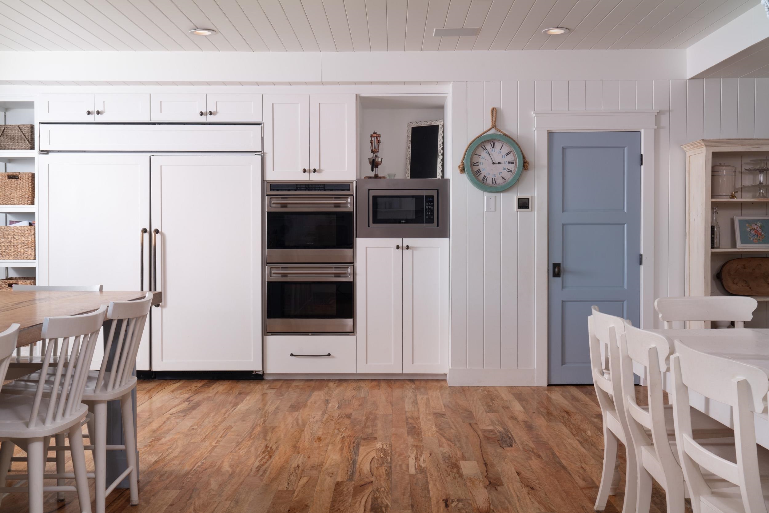 1630 Olinda Road Makawao, HI 96768 - Photo 6 of 50 a view of kitchen with stainless steel appliances granite countertop cabinets and wooden floor
