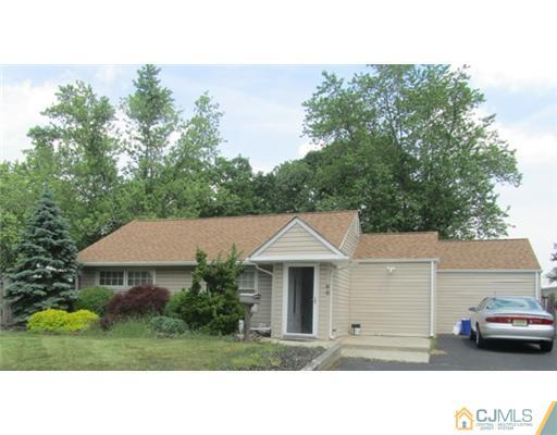 60 Glenville Road Edison, NJ 08817 - Photo 1 of 8 a aerial view of a house with a garden