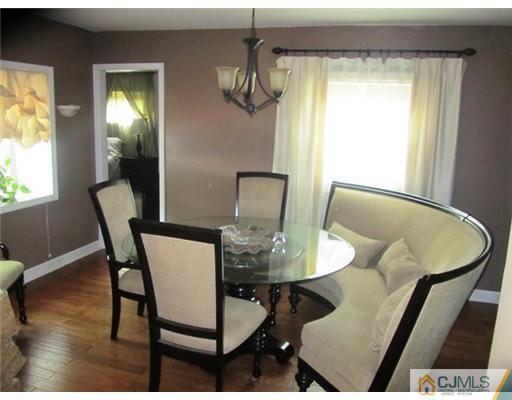 60 Glenville Road Edison, NJ 08817 - Photo 3 of 8 a view of a dining room with furniture and window