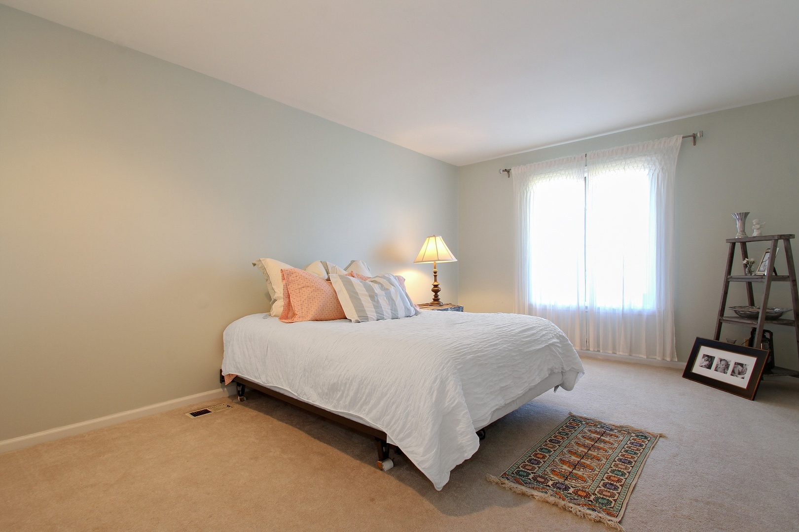77 Brandon Road Northfield, IL 60093 - Photo 11 of 18 a bedroom with a bed and a window