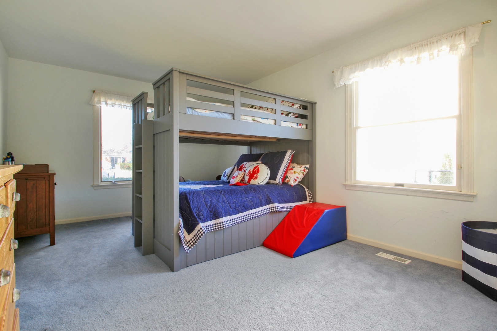 77 Brandon Road Northfield, IL 60093 - Photo 12 of 18 a bedroom with a bed and a window