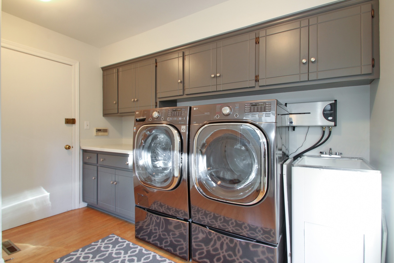 77 Brandon Road Northfield, IL 60093 - Photo 15 of 18 a utility room with dryer and washer