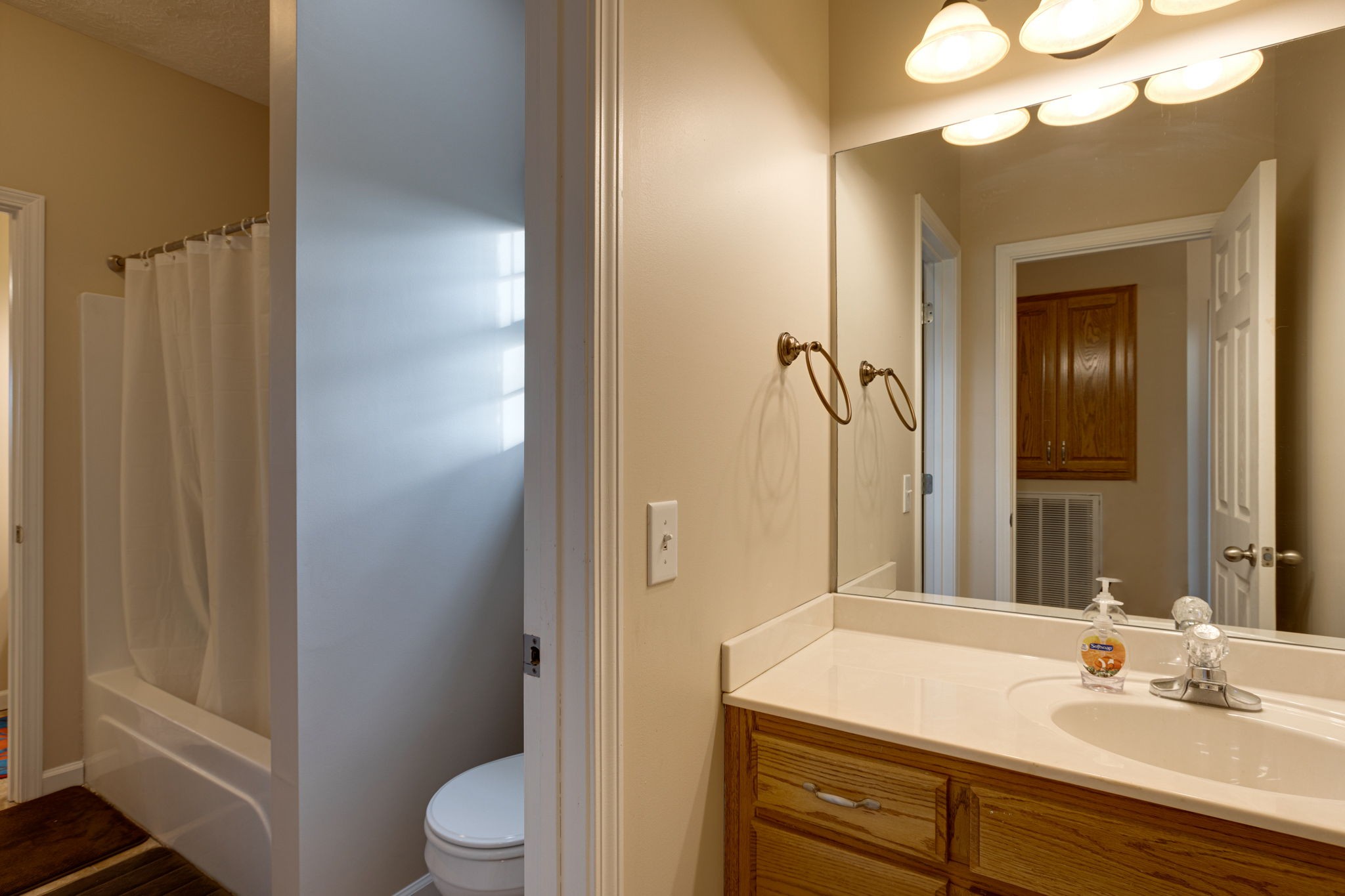 621 Jackson Road Portland, TN 37148 - Photo 15 of 32 a bathroom with a sink a toilet and shower